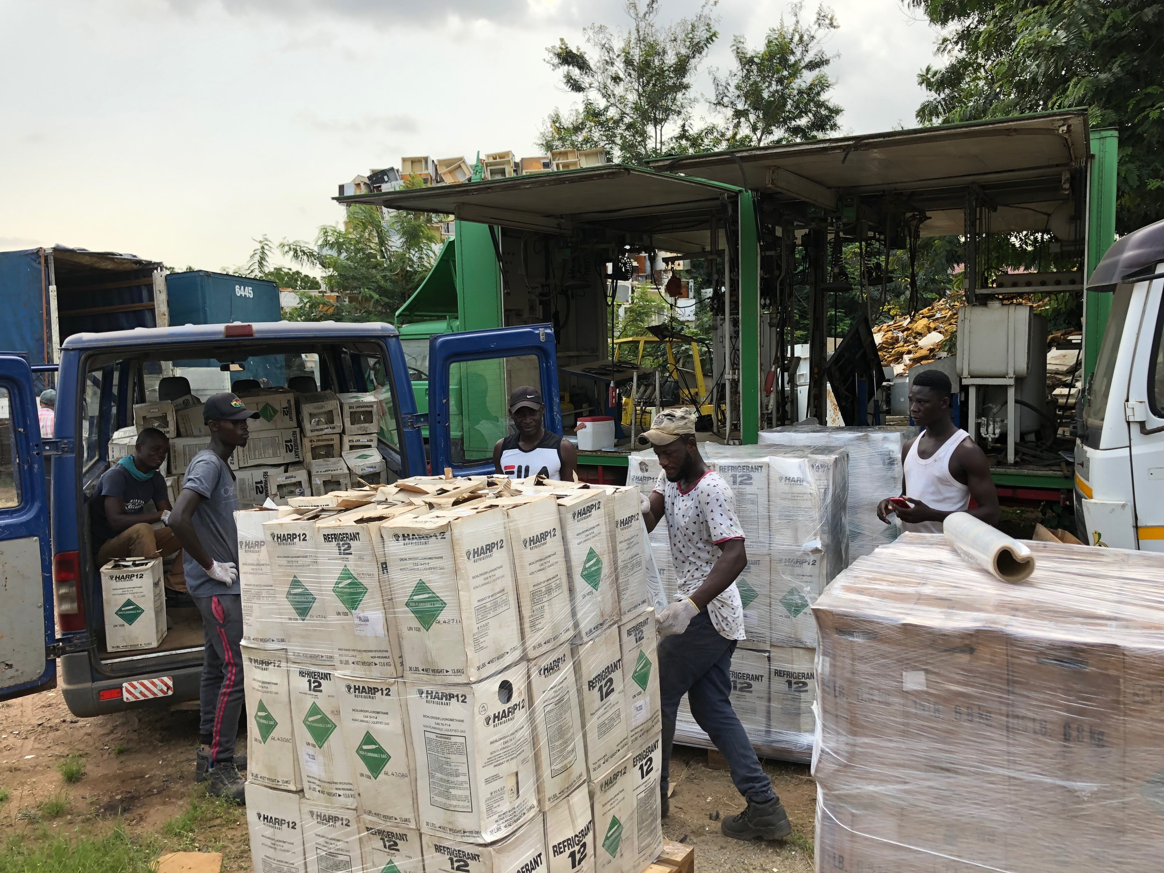refrigerant gasses being loaded up by several men for proper disposal, photo provided by Tradewater.