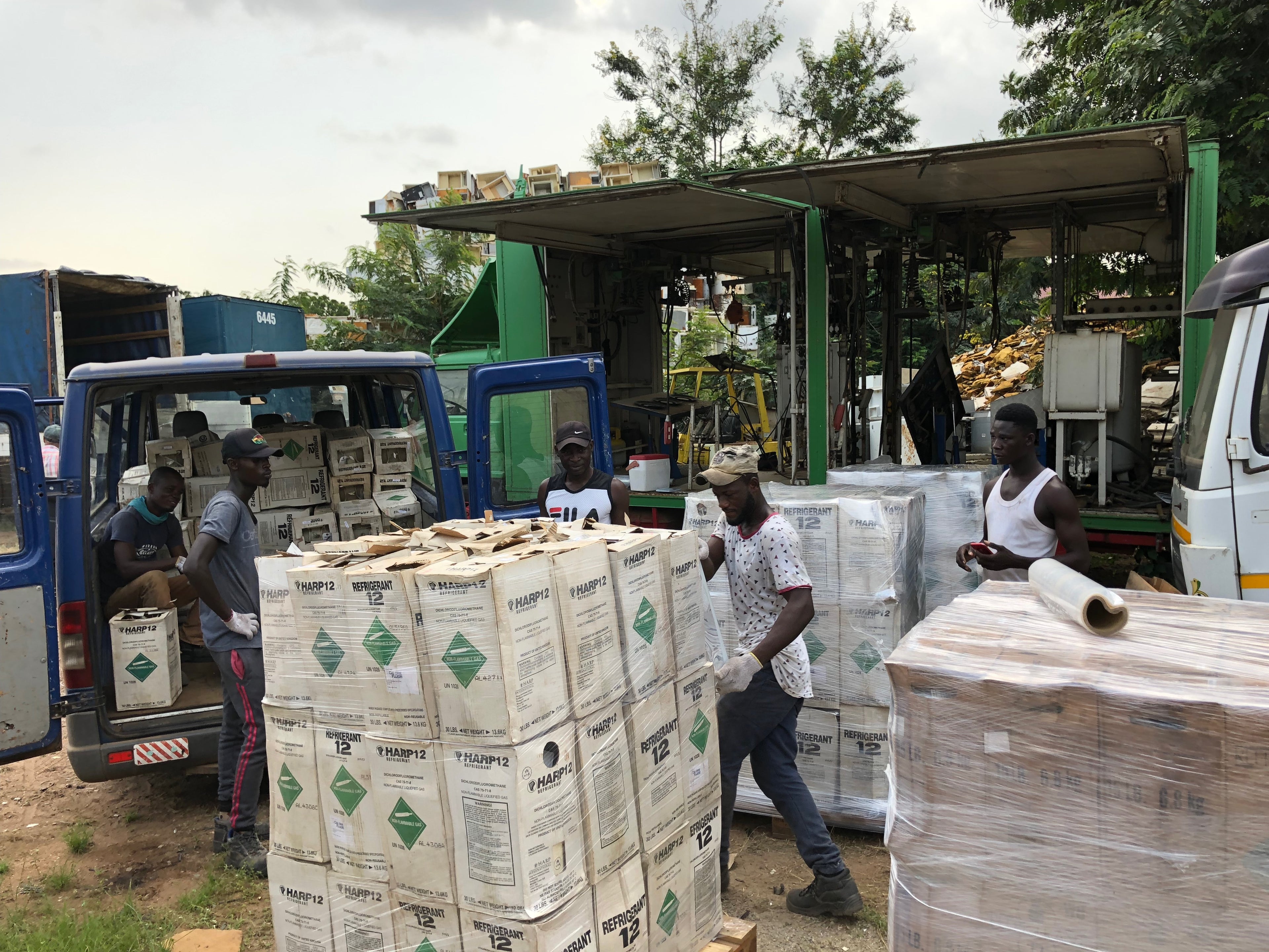 refrigerant gasses being loaded up by several men for proper disposal, photo provided by Tradewater. 